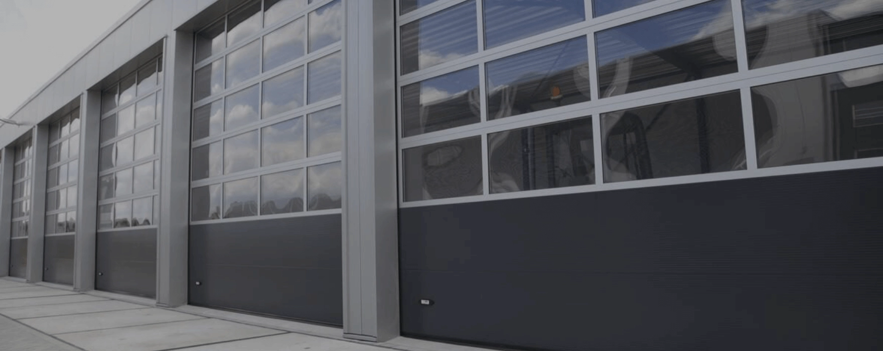 Industrial garage doors LOMAX header