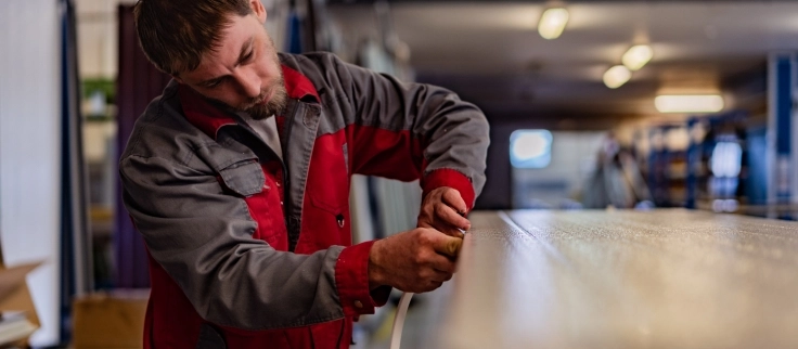 LOMAX garage door production worker