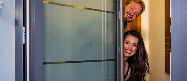 Couple in LOMAX entrance door